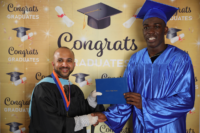 Picture 03 a – Dr. Terrence Narinesingh, Ph.D. at Broward County Public Schools Graduation with graduating senior Dareunte Price
