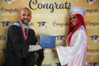 Picture 08 a – Dr. Terrence Narinesingh, Ph.D. at Broward County Public Schools Graduation with graduating senior Justina Brown